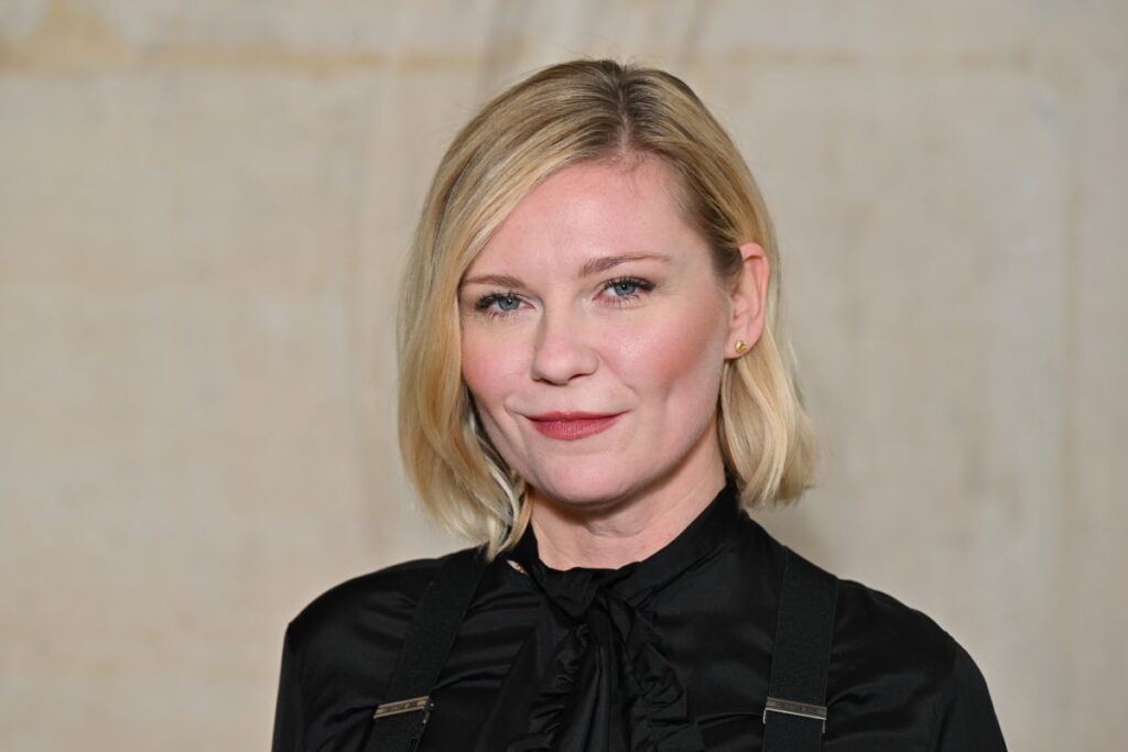 Kirsten Dunst Net Worth attending a film premiere