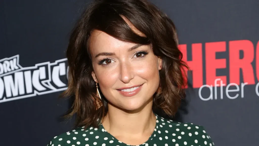 Milana Vayntrub Net Worth attending a film premiere.